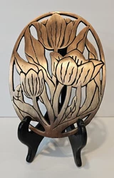 Beautiful Vintage Hot Plate MCM Trivet Tulips Footed Marble Design 1982. This trivet is oval in shape and features a...