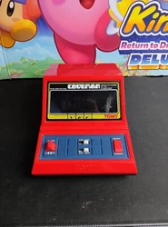 Jeu Électronique LCD TOMY CAVEMAN VINTAGE Type NINTENDO GAME WATCH Année 80 semble en bon état. Je ne sais pas si il...