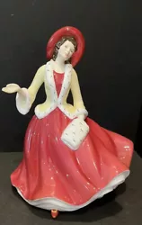 This beautiful Royal Doulton figurine depicts one of the Pretty Ladies collection in a stunning red dress, specially...