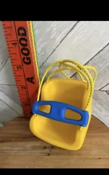 This vintage Little Tikes dollhouse with a blue roof and yellow hanging baby swing is a rare find and in excellent used...