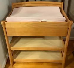 With Shelves and drawer.