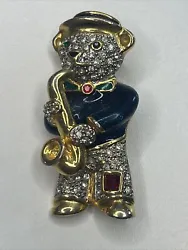 Blue Jacketed Bear Playing Saxophone Pin with Clear Crystals. DescriptionUp for your consideration is a Bear in a blue...