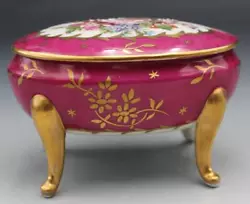 This listing is for a beautiful French Limoges dresser box with lid. It features a pretty deep magenta with an oval...