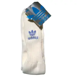 White socks with Logo that is purplish blue color.
