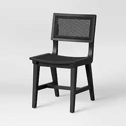 •Black wooden dining chair with rattan open-weave lattice design for timeless flair •High back and curved seat keep...