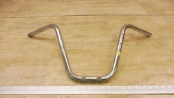 ORIGIN: 1978 Puch pedal moped with unknown miles. FOR SALE: handle bars.