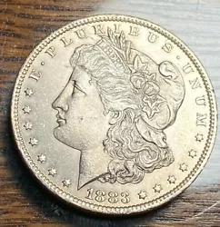 Nice white unc. with a few obverse ticks.