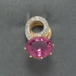 2.5 CT Pink tourmaline pendant with 1/5 CTW diamond accents. 10.1 mm wide.