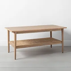 Founded atop 4-point legs for better stability, the coffee table showcases a neutral solid finish that blends...