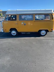 This 1977 Volkswagen Transporter is a true classic with a vibrant yellow color that is sure to turn heads. The interior...
