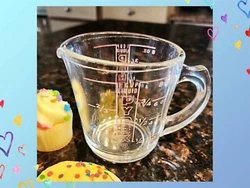 All of the lettering is intact. The lettering is Pink. The glass is not crystal clear. it has a bit of a milky look....