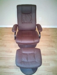 Giantex PU Leather  360 degree Swivel, Recliner Chair with Wrapped Base and Matching Ottoman Footrest. I bought this...