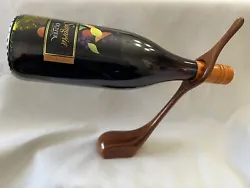 Wine Bottle golf club Holder Solid Polished Wood Self Balancing Freestanding. Bottle of Oliver’s not included.