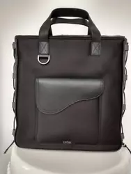 You are buying this Authentic Christian Dior Black Nylon North - South Saddle Tote. The Saddle tote bag has a modern...