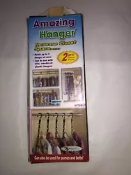 Amazing hanger to help with closet organizing. Plastic box has been open.