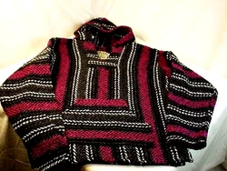 Size Small. Clean condition with bright colors. No issues. 23 1/2