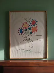 Own a rare vintage lithograph by the renowned artist Pablo Picasso. This print features the beautiful floral and...