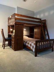 This bunk bed is perfect for kids who want a space-saving and stylish addition to their bedroom. Made of solid wood,...