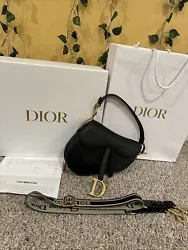 Christian Dior Saddle Bag . Condition is New with tags. Shipped with UPS Ground.