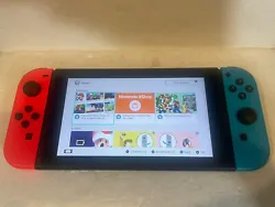 Nintendo Switch V1 Console Unpatched Low Serial XAW1 HAC-001 w/Red/Blue joycons. Excellent condition, just a couple...