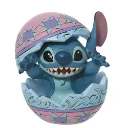 Popping out of an egg shell, Stitch the alien gleefully wishes you and yours a happy Easter. Jim Shore Disney...