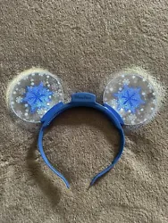 Disney Parks Light-up Clear Mouse Ears Blue Snowflakes RARE!. Condition is Used. Shipped with USPS Ground Advantage.
