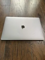 macbook pro 2017 15 inch touch bar. (NOT WORKING - DAMAGED)Screen does not turn on, W S A keys are all damaged, slight...
