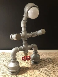 Industrial Steampunk Robot Wrought Iron Pipe Table Lamp Hand wheel Switch. Small crack on light cover, does not effect...