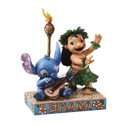 Stitch picks at his Hawaiian guitar while lilo dances her native luau. Lilo And Stitch. Jim Shore Disney Traditions...