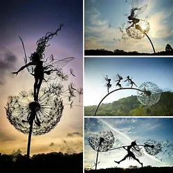 Elaborate design: Fairy statue, butterfly net is made of barbed wire. A butterfly hung on her net (as if she had just...
