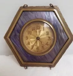 Very cool small antique clock has crack in crystal glass on front as you can see from pictures,also seems to be missing...