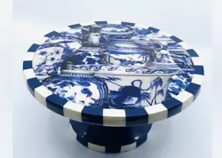 Annie Modica created this beautiful conversation piece cake stand in her hometown of San Rafael, California. Features...