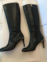 Beautiful smooth leather Coach tall boots for women, size 10 medium.  These boots have an inside zipper and goldtone...