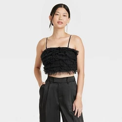 •Cropped tiny tulle tank top •Ruffled bodice, adjustable straps •Pullover style •Solid color •Recycled...
