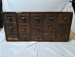 Vintage 15 Drawer Wood Library Card Catalog Apothecary Cabinet is a very cool piece. This cabinet is in good shape...