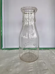 Embossed Glass Milk Bottle ~ Monson Milk Co. Springfield Massachusetts ~ Quart. Scalloped finish on neck