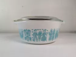 This dish is is near perfect condition. There are very faint marks on edge of handles. The lid has a small chip on the...
