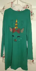 This is a girls Minnie Mouse Christmas dress size L (10-12). The green dress has long sleeves and the beige dress has...