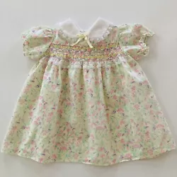 Excellent vintage condition Size: 12 months Short sleeves Back buttons Cotton, polyester Length: 15 inches Armpit to...