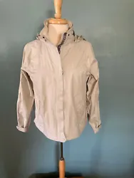 This LL Bean white zippered raincoat has beautiful detailing on zipper enclosure, back shoulder and pocket. Has...