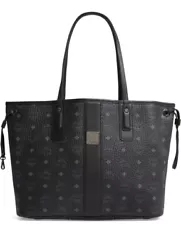Side drawstrings let you transform the silhouette from rectangular to trapezoidal. You are only purchasing the tote....