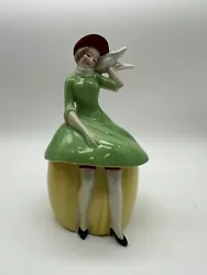Antique Dresser Box Germany Lady with Scarf Green Dress. Feisty little lady with her red hat and white scarf blowing in...