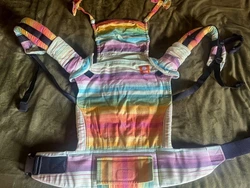 This TULA baby carrier is perfect for infants and comes in a beautiful multicolor design in a full wrap conversion. The...