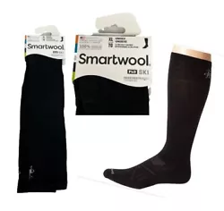 Smartwool PhD Ski Socks. The PHD Ultra Light Ski Socks feature over the calf body. Solid black.
