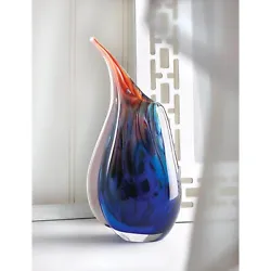 ART GLASS VASE. All the lovely colors of a splendid dream are captured in glass for you to enjoy with this artistic...