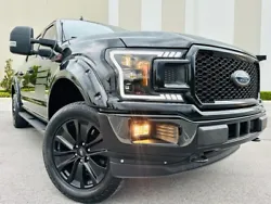 (Beautiful 2018 Ford F-150 XLT. REBUILT TITLE VEHICLES. Exclude Alaska and Hawaii). This vehicle passed a Florida...