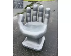 For sale is a NEW GIANT left Hand Shaped Chair. The plastic has a stone-like appearance. The plastic is solid colored...