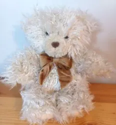 Preowned and in great condition. No tears, holes or stains. Disinfected and ready to use. Adorable teddy with fur -just...