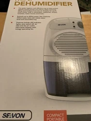 Seavon MD-819 500ml Electric Mini Dehumidifier - White. Shipped with USPS Priority Mail.