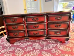 French Provincial style dresser with nine jewelry boxes/drawers, each lined with felt. Open the middle bottom drawer...